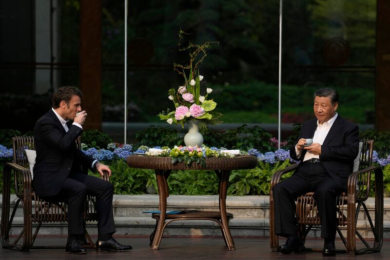 Presidente de Francia Emmanuel Macron y su homólogo chino Xi Jinping